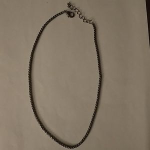 Silver tone and black chain